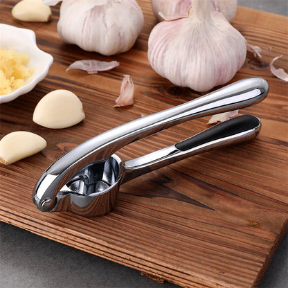 LMETJMA Premium Garlic Press Stainless Steel Garlic Mincer Garlic Crusher Easy to Squeeze and Clean Kitchen Tools JT202