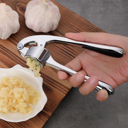 LMETJMA Premium Garlic Press Stainless Steel Garlic Mincer Garlic Crusher Easy to Squeeze and Clean Kitchen Tools JT202